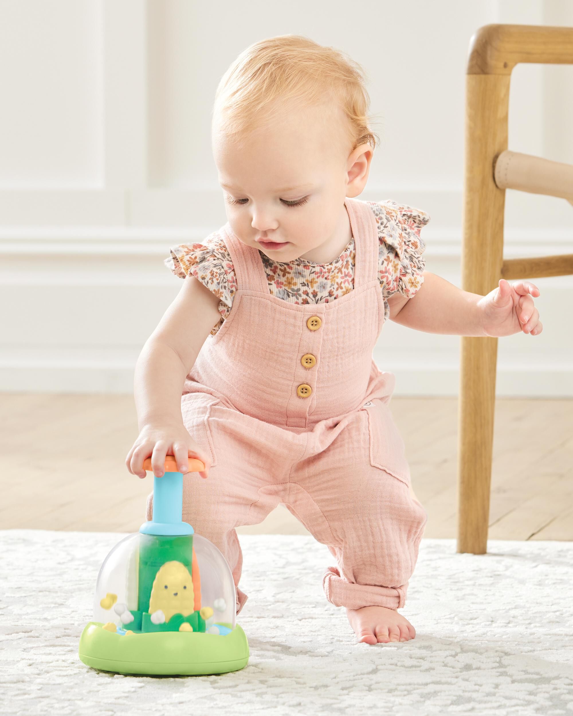 Push and spin baby toy top