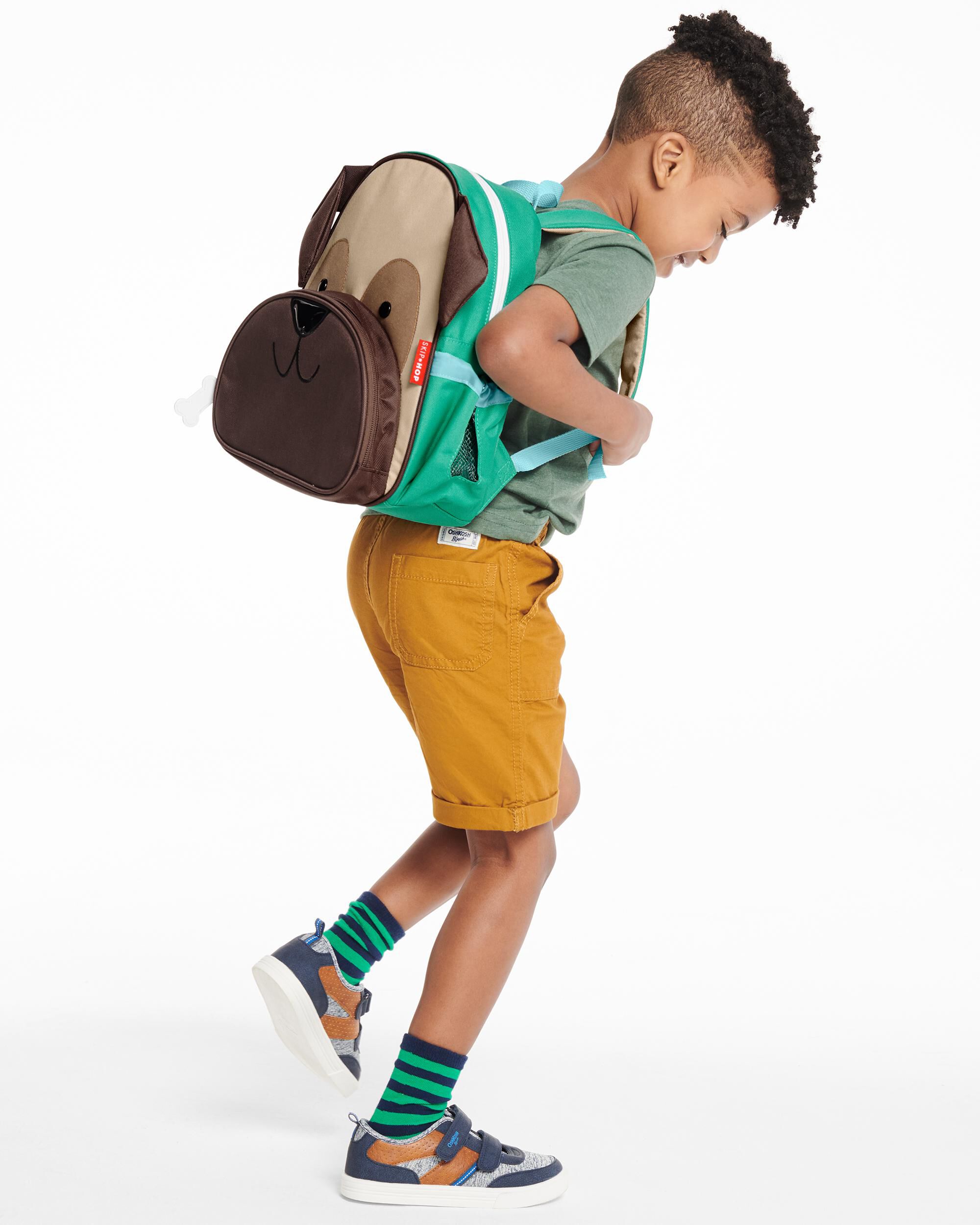 Kid holding backpack clearance