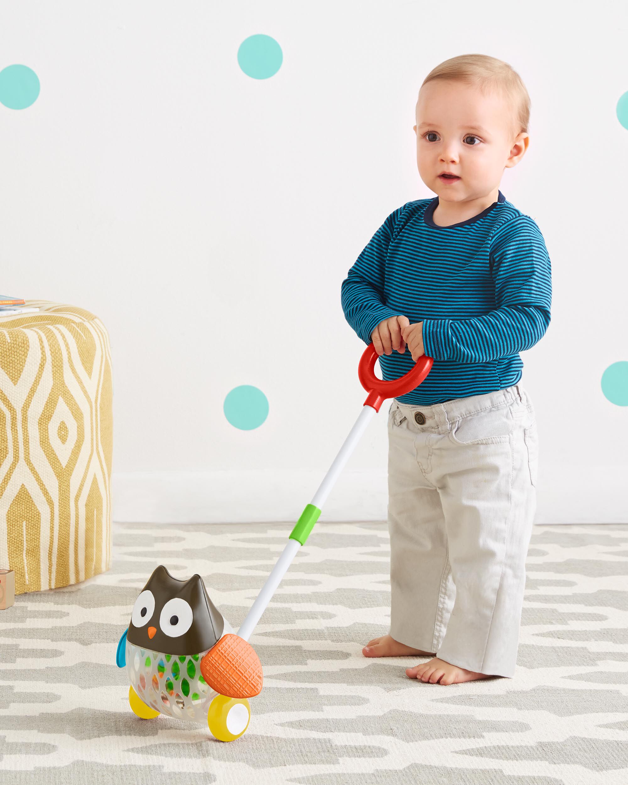 skip hop explore and more rolling owl push toy
