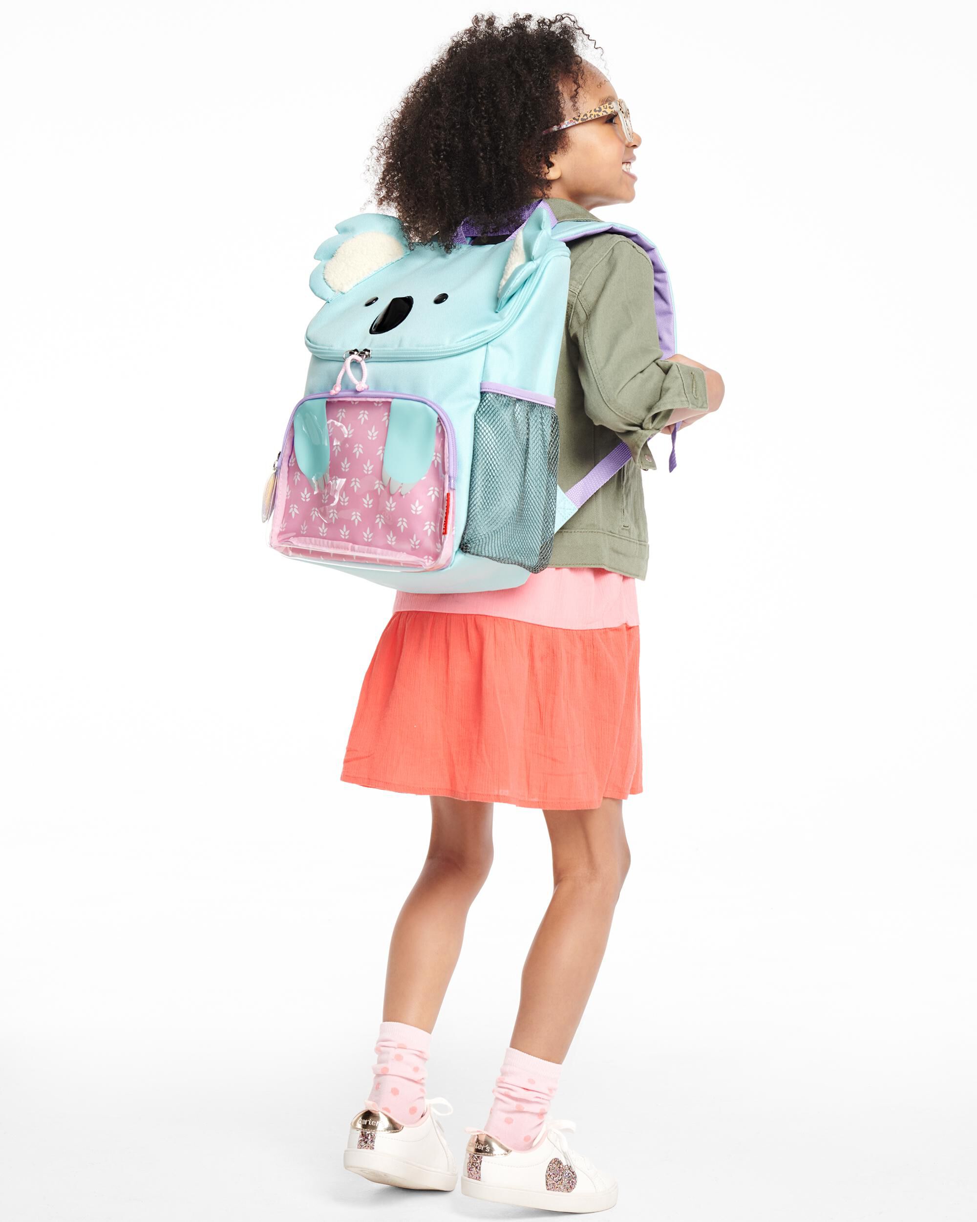 Kid with big discount backpack